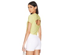 Beyond Yoga RÜCKENFREIES CROPPED-T-SHIRT FEATHERWEIGHT in Yellow