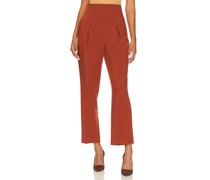 1. STATE High Waisted Pleated Carrot Pant in Rust