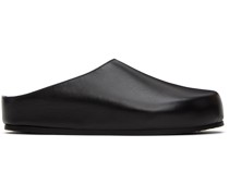 Black Wearing Clogs