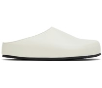 White Wearing Clogs