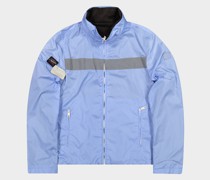Reversible jacket with reflective contrasts