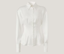 Shirt with pleats at the waist