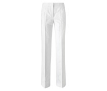 White trousers with embossed polka-dots