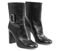 Black leather ankle boots with buckle