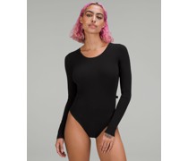 Eng anliegender, langärmeliger Strick-Body