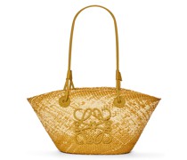 Luxury Small Anagram basket bag in iraca palm and calfskin