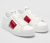 Prada Geschnürte Sneaker aus Leder Mit Logo, Damen