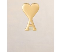 Ohrring aus vergoldetem Messing. Gold Unisex