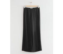 Figurbetonte Satinhose mit Beinschlitz - Schwarz