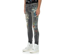 Destroyed Skinny Jeans mit Farbklecksen
