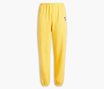 Cropped Track Pants aus Fleece it Stickereien