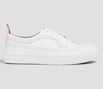Sneakers aus lasergeschnittenem Narbenleder