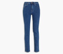 Hoch sitzende Skinny Jeans 26