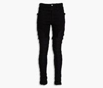 Hoch sitzende Skinny Jeans mit Cut-outs 25