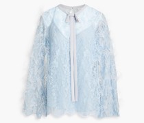 Bluse aus Spitze mit Federn und Schleife