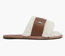 Muchas Slippers aus Shearling mit Lederbesatz