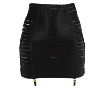 Minirock aus Satin mit Strapshaltern „Waspie“