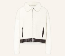 Lammfell-Jacke im Materialmix