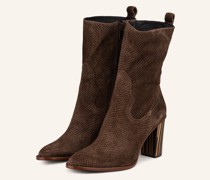Welche Kriterien es bei dem Bestellen die Zinda sandalen zu untersuchen gibt
