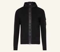 Strickjacke im Materialmix