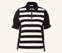 Poloshirt im Materialmix