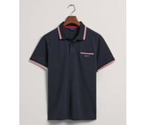 Poloshirt mit Kontrast-Streifen und Brusttasche