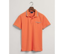 Poloshirt mit Kontrast-Streifen und Brusttasche